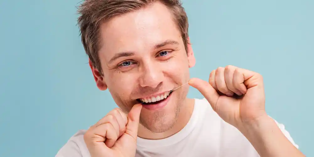 Man flossing